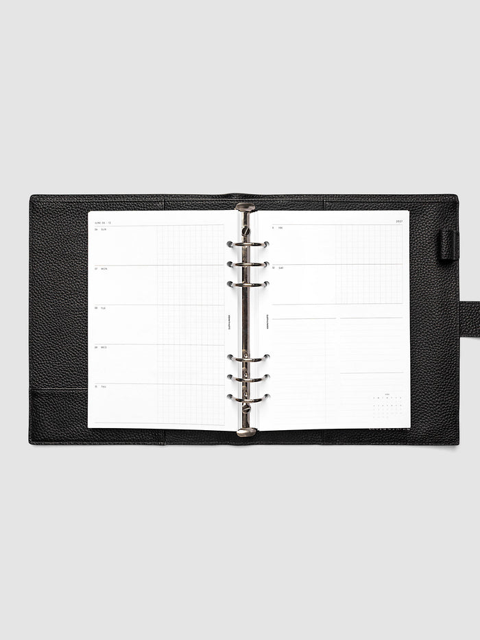2027 Dated Weekly Horizontal Planner Inserts, Sunday Start, A5 6-Ring Punch, full week-on-two-pages horizontal spread showing each day split into open and graph columns, with tasks column, notes column, and mini monthly calendar on the right page, shown inside a planner
