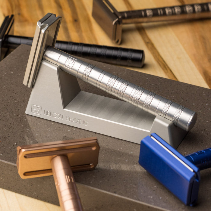 Safety razors in multiple colours with stand on wood counter – Calgary shaving essentials at Greenbriar Market