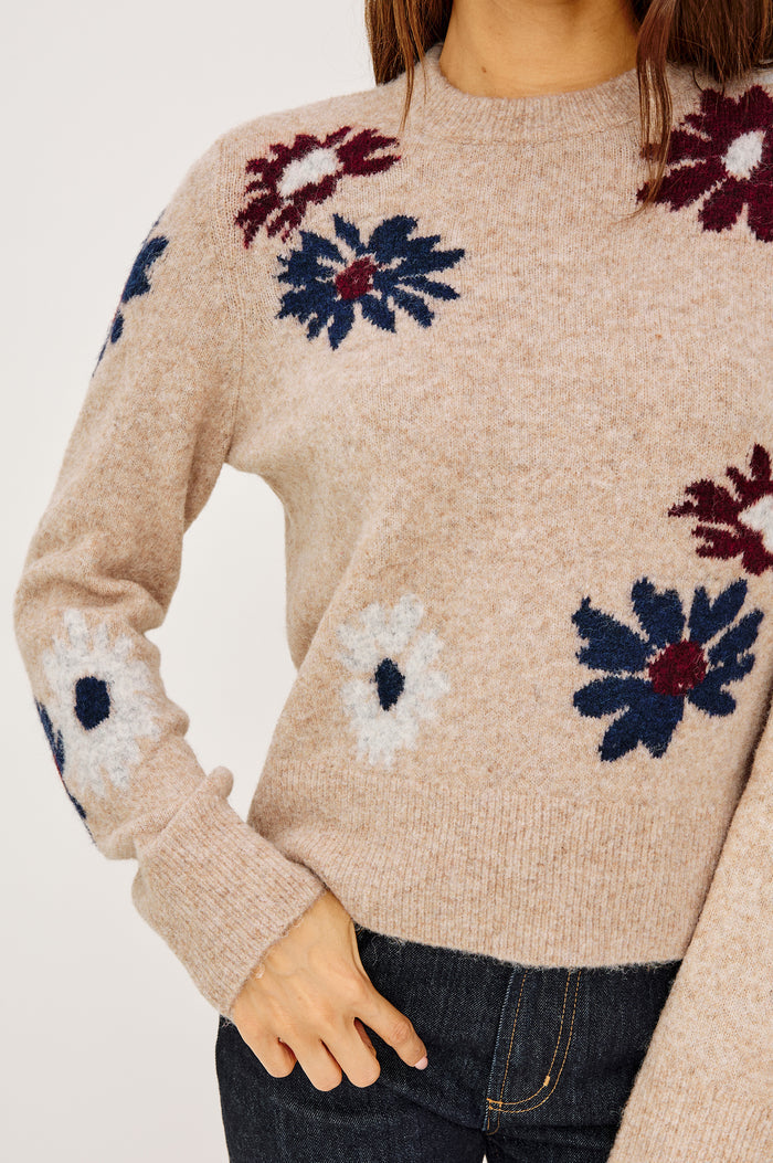 Anise Sweater in Wool Blend With Contrast Floral Motifs, Crew Neckline, Long Sleeves, and Relaxed Boxy Fit in Oat Daisies Colorway - Upper Body Close Up View Featured on Model