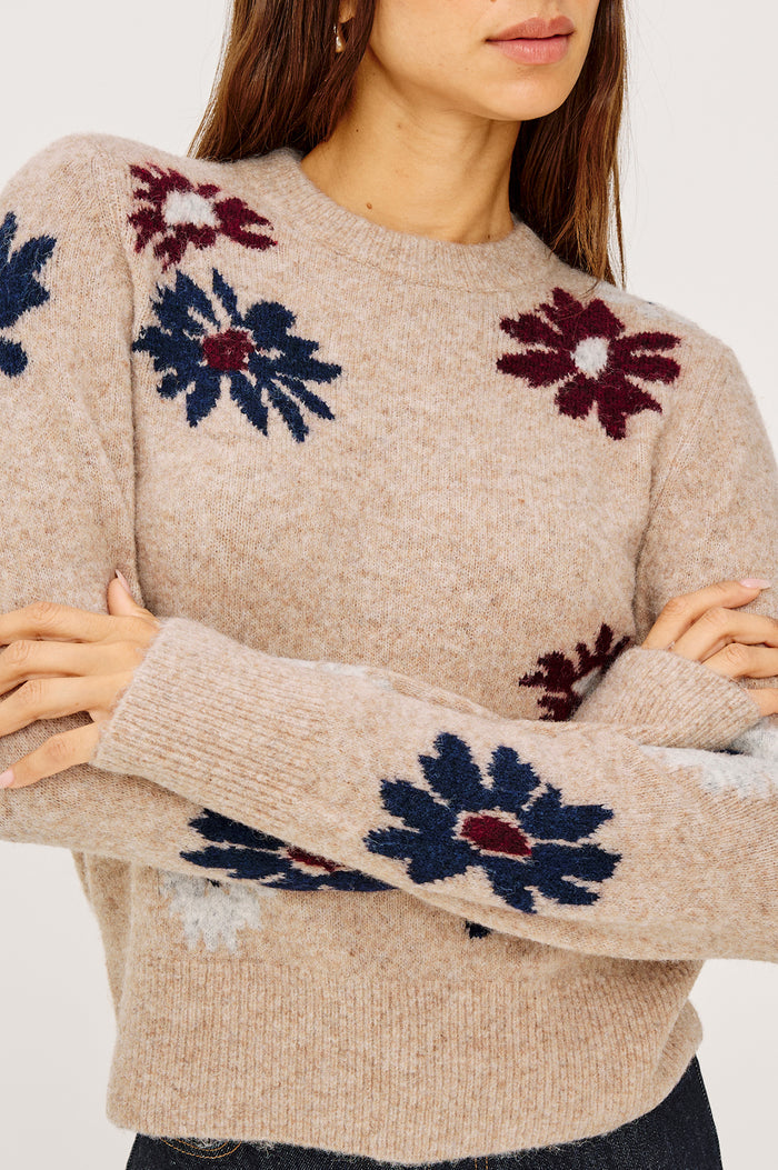 Anise Sweater in Wool Blend With Contrast Floral Motifs, Crew Neckline, Long Sleeves, and Relaxed Boxy Fit in Oat Daisies Colorway - Upper Body Close Up View Featured on Model