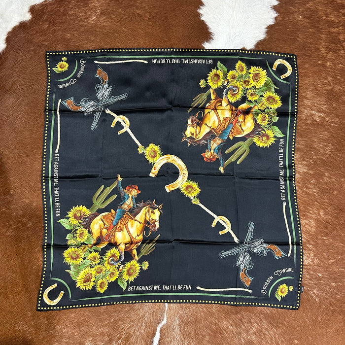 Black bandana with cowboy images and sunflowers.