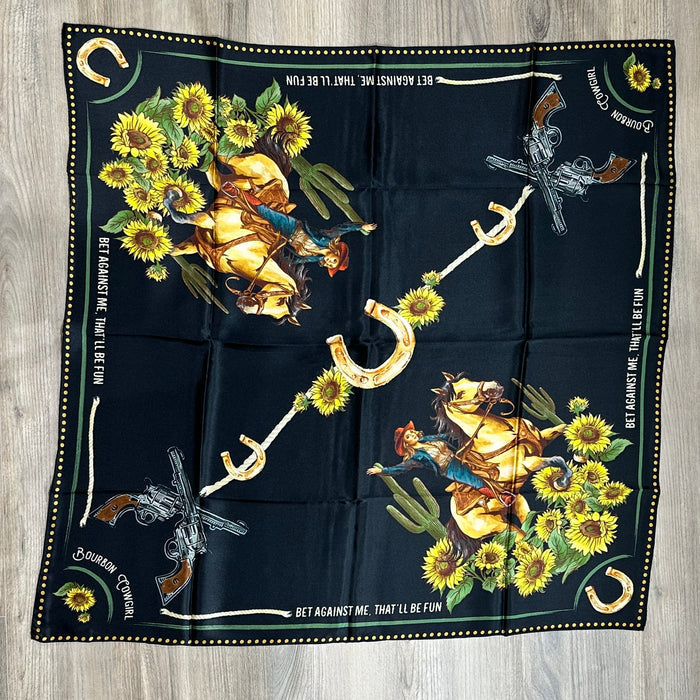 Black bandana with cowboy and floral design.