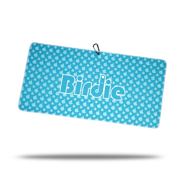 The Birdie Finger - Towel is a blue rectangular microfiber towel with a white bird pattern and "Birdie" in bold white letters. It includes a black loop with clip and eyelet for hanging, and casts a soft shadow underneath.