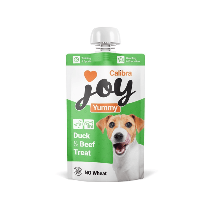 White background with a white and green pouch of Calibra Joy Yummy paste treat in Duck and Beef flavour.