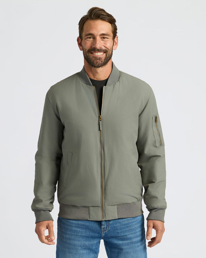 Carbon Bomber Jacket worn with jeans and a black T-shirt.