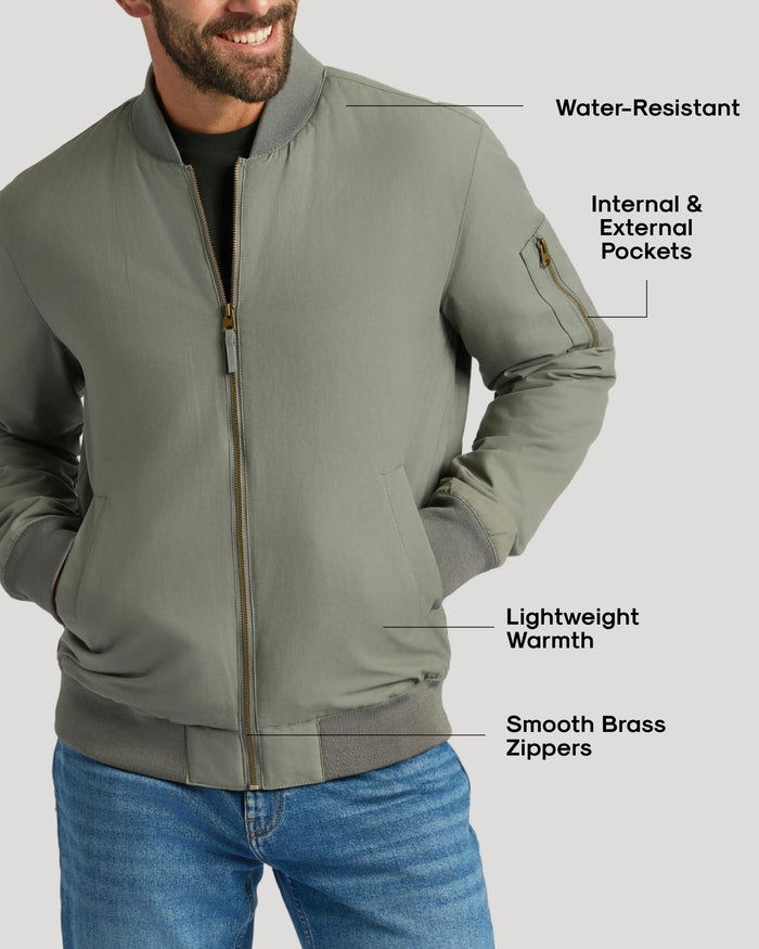 Carbon Bomber Jacket with brass zippers and highlighted features.