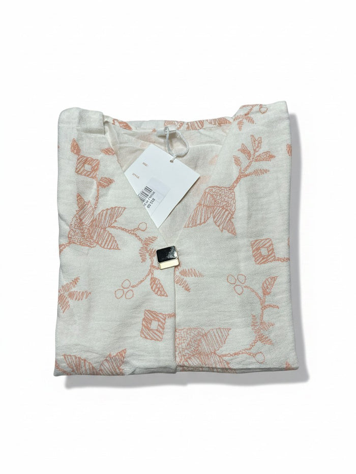 Kurti Connection USA white chiffon short kurti with delicate peach floral embroidery and a decorative front button.