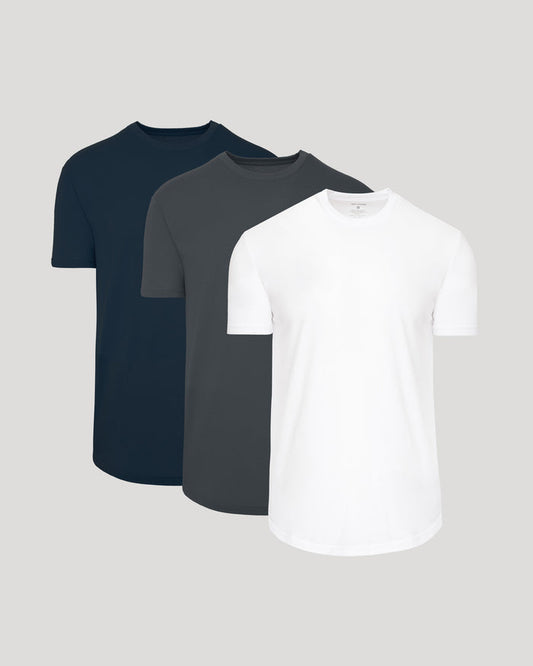 Three plain t-shirts in navy, gray, and white on a light gray background