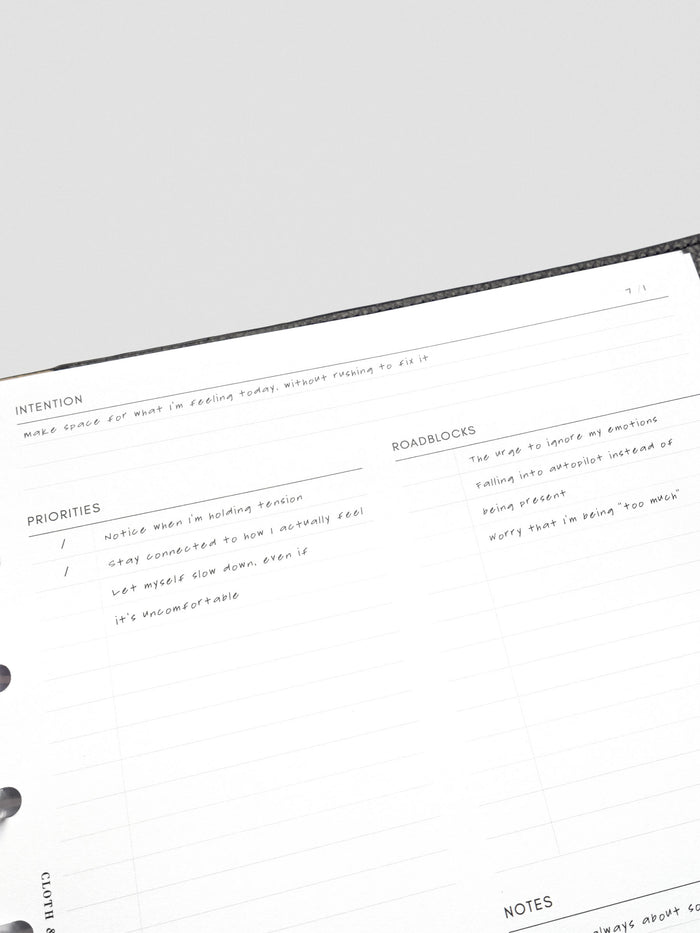 Close up of the Daily intention Planner Inserts showing the header and sections for Intention, Priorities, and Roadblocks with example text filled in on the theme of making space for what I'm feeling today without trying to fix it.