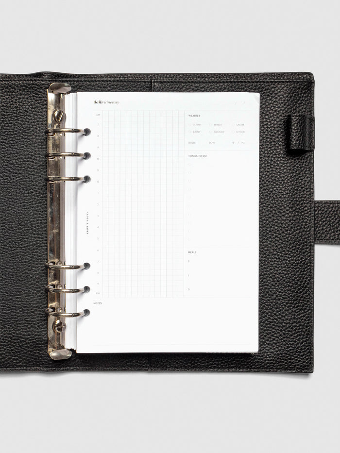 Insert in use inside a black leather folio.