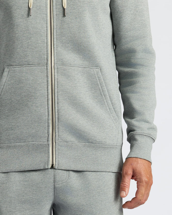 Gray zip-up hoodie with a white background
