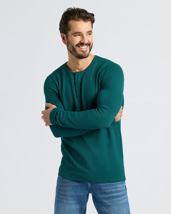 Man wearing Deep Emerald Waffle Long Sleeve Henley.