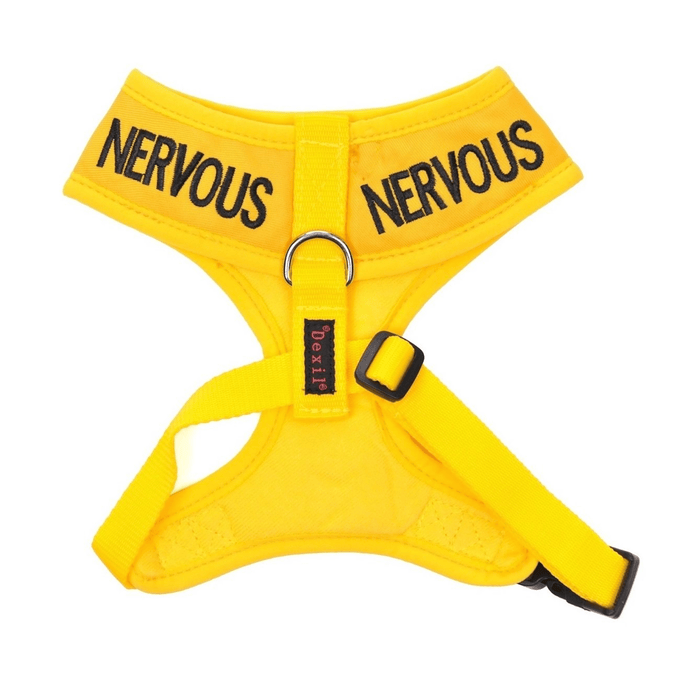White background with a Dexil yellow dog vest harness with 'Nervous' embroidered twice on the top part.