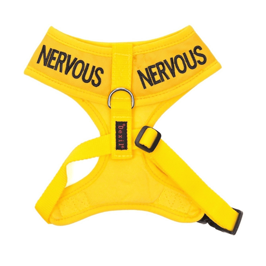 White background with a Dexil yellow dog vest harness with 'Nervous' embroidered twice on the top part.