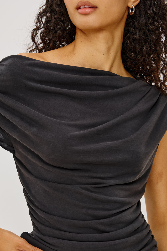 Dominic Top in Soft Jersey With Off-The-Shoulder One-Shoulder Design, Shirred Shoulders, and Ruched Waist in Ash Colorway - Upper Body Front View Featured on Model