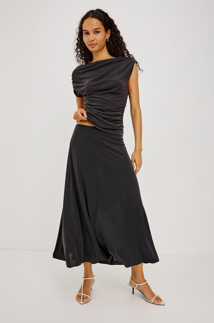 Dominic Top in Soft Jersey With Off-The-Shoulder One-Shoulder Design, Shirred Shoulders, and Ruched Waist in Ash Colorway - Full Body Front View Featured on Model