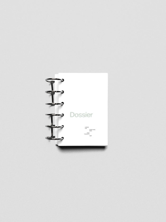 Dossier Planner Dashboard in Pocket size shown ring bound.