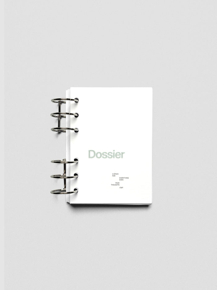 Dossier Planner Dashboard in A6 size shown ring bound.
