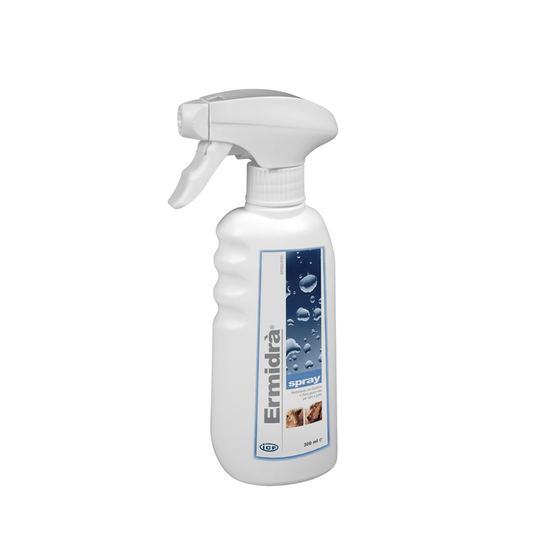 White spray bottle with a label on a white background