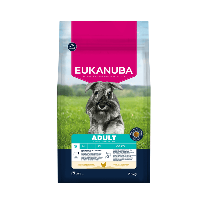 A 7.5kg bag of Eukanuba Adult dog food for dogs, featuring a Schnauzer on a green grassy field. The packaging has a bright pink top section with white text, a teal band with product details, and a dark blue base.