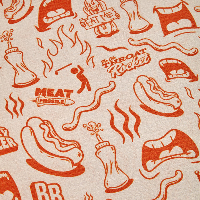 The Glizzy Gobbler - Towel is a double-sided tan microfiber towel with red cartoon hot dogs, campfire scenes, open mouths, playful phrases like Eat Me and Meat Missile, plus a clip and eyelet for easy hanging.