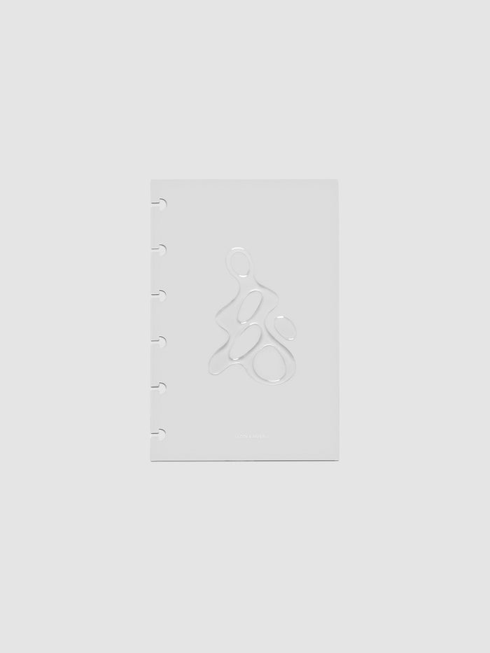 Light grey, semi-transparent, and glossy plastic planner dashboard with organic raised shape design in size CP Petite on a neutral background.