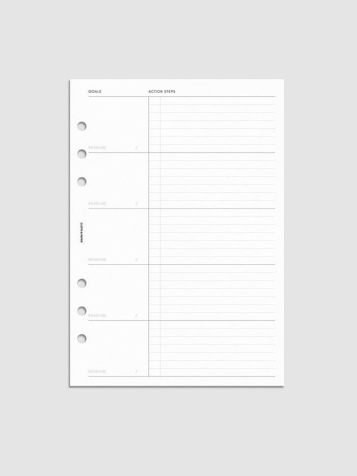A blank planner page with sections for goals, deadlines, and action steps, featuring six holes for binder insertion. The left side has labeled boxes for goals and deadlines, while the right side has lined space for action steps.