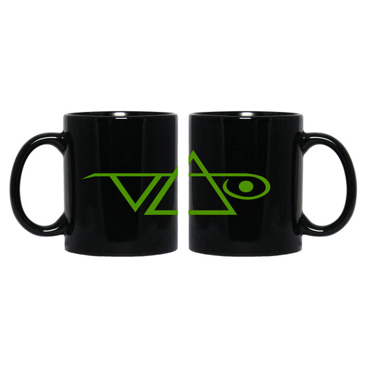 Image of a black coffee mug against white background. the mug has the steve vai logo in it in green.  The steve vai logo makes the word "vai" with an upside down triangle, a right side up one, and a line going across the triangles with a curl at the end next to the triangle that is upright.