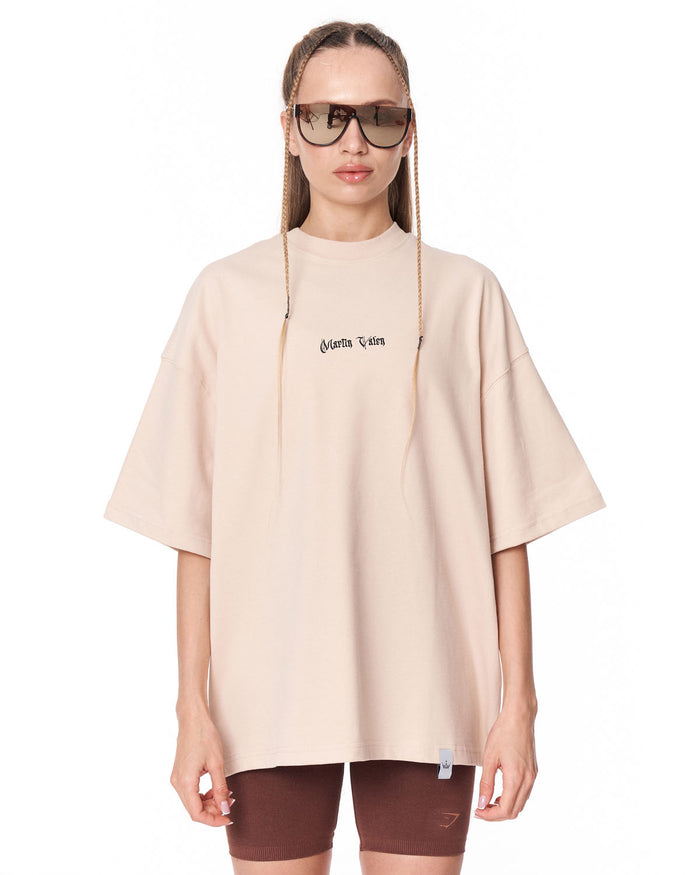 Heritage Fusion Beige Oversized T-shirt styled with brown biker shorts