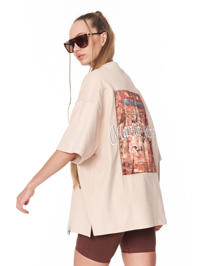 Heritage Fusion Beige Oversized T-shirt paired with white sneakers