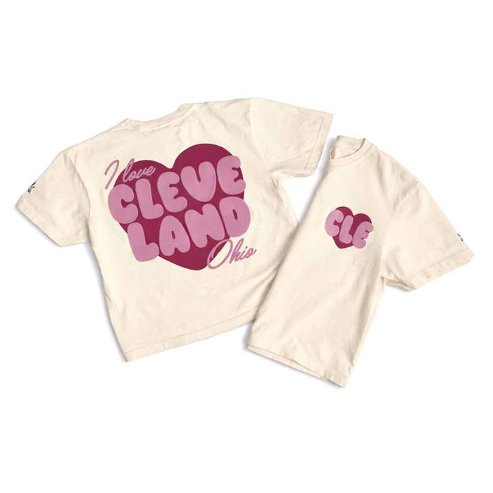 Two cream-colored t-shirts with pink 'I love Cleveland, Ohio' design on a white background