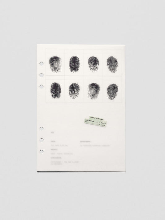Two layered A5 sized planner dashboards, one semi-transparent, one matte, featuring a fingerprint design.