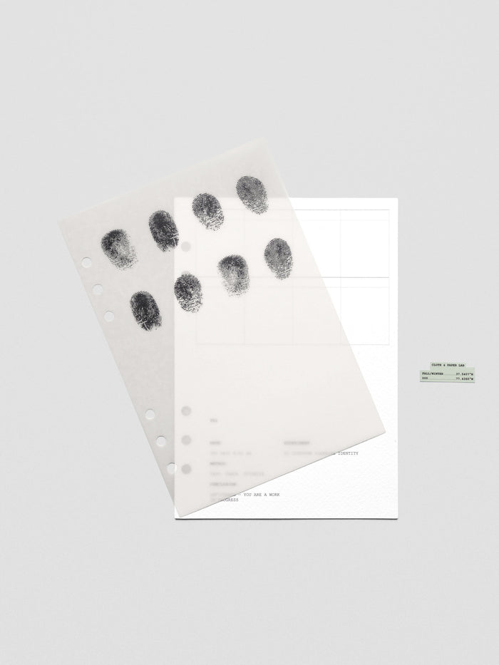 Two layered A5 sized planner dashboards, one semi-transparent, one matte, featuring a fingerprint design shown offset from one another.