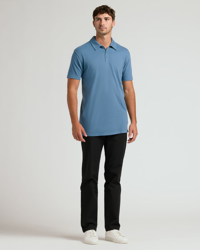 Indigo Short Sleeve Tall Polo on tall model, showcasing fit.