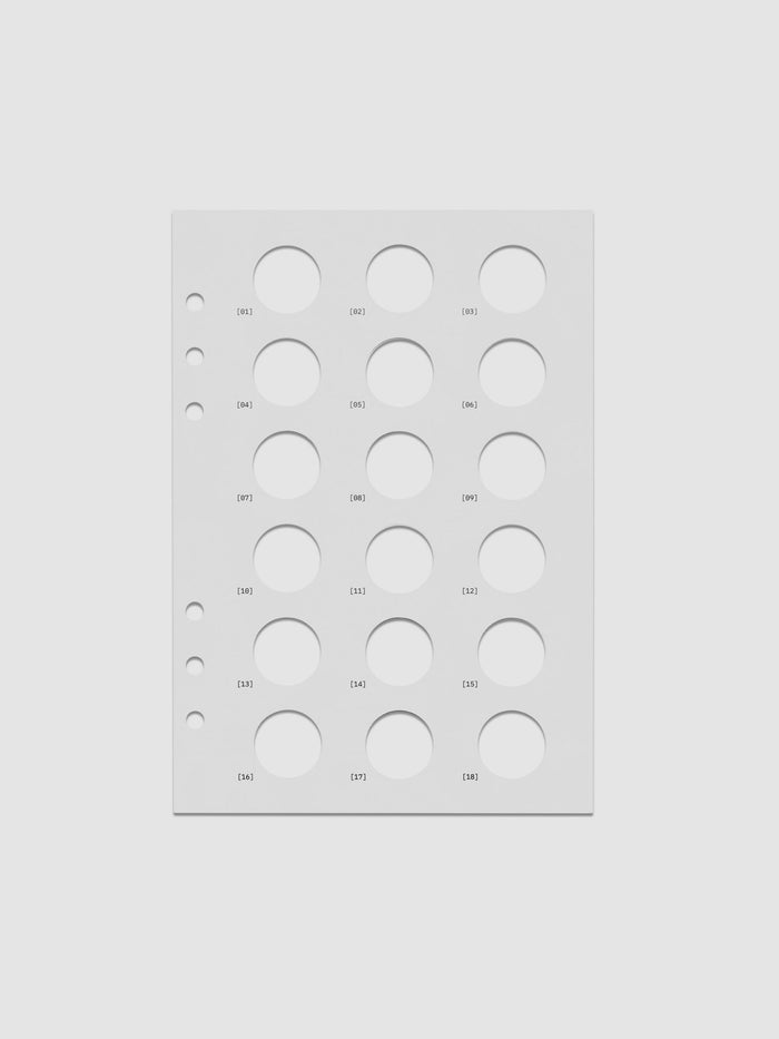 One transparent dashboard with 18 circular cut outs. One piece from the Inner Blueprint Dashboard Duo shown in size A5.