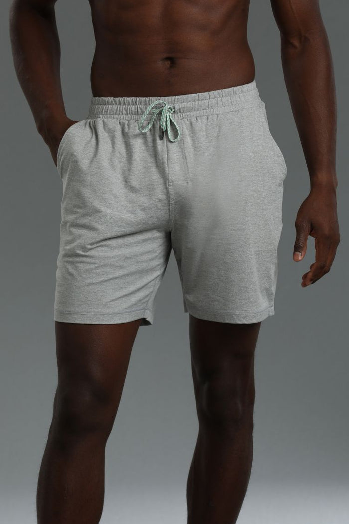 Person wearing gray shorts on a plain background || Light Heather Gray - 1