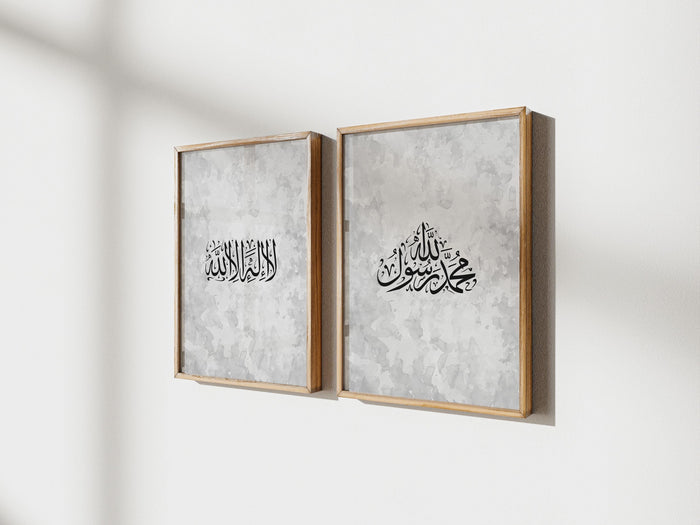 Close-up of bold Arabic script on white canvas with subtle texture
