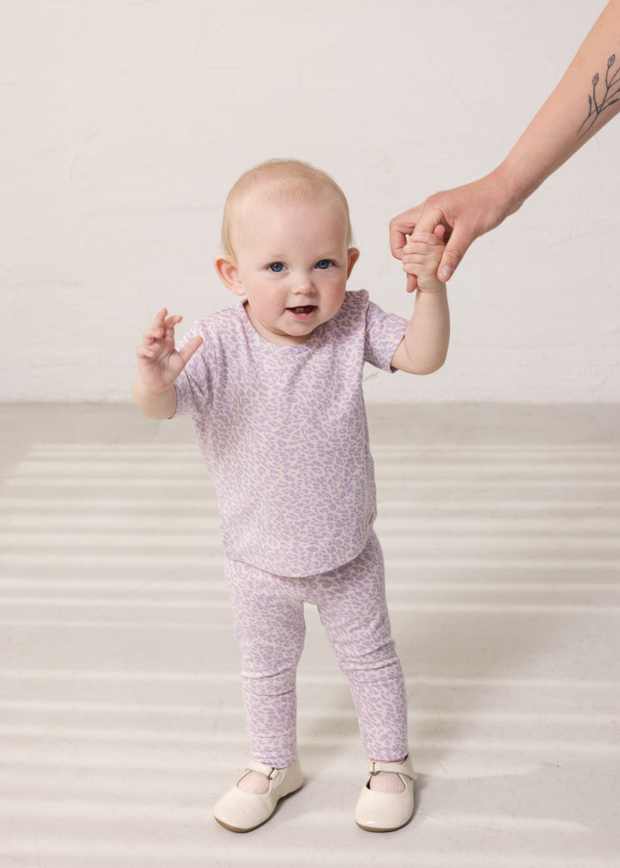 Leo Leg leggings with light purple leopard pattern on baby legs