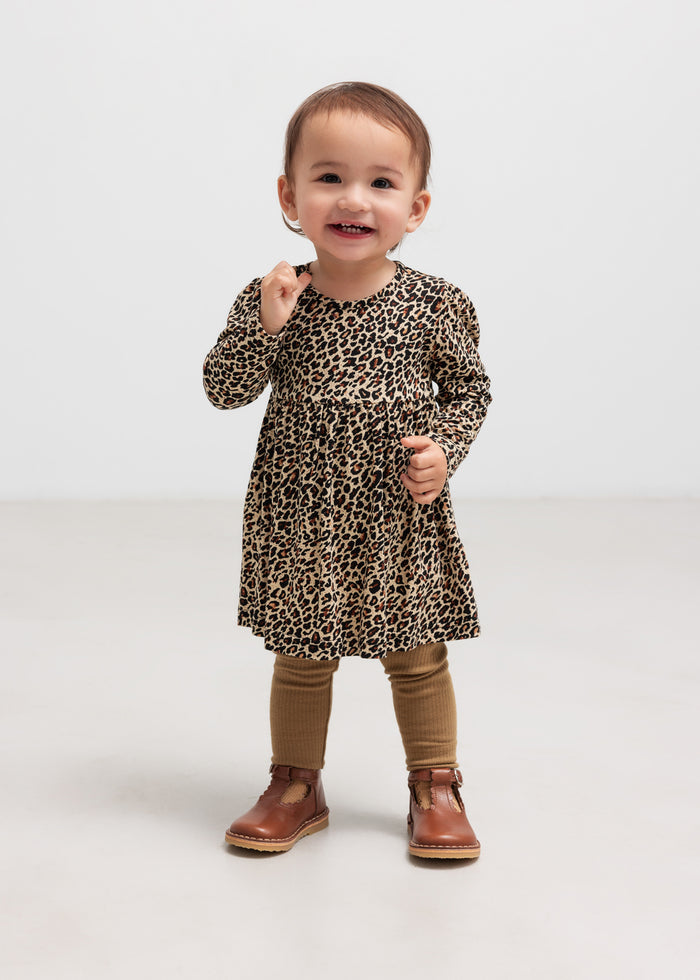 Girl in leopard dress with bodysuit