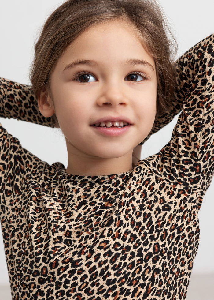 Girl in leopard blouse