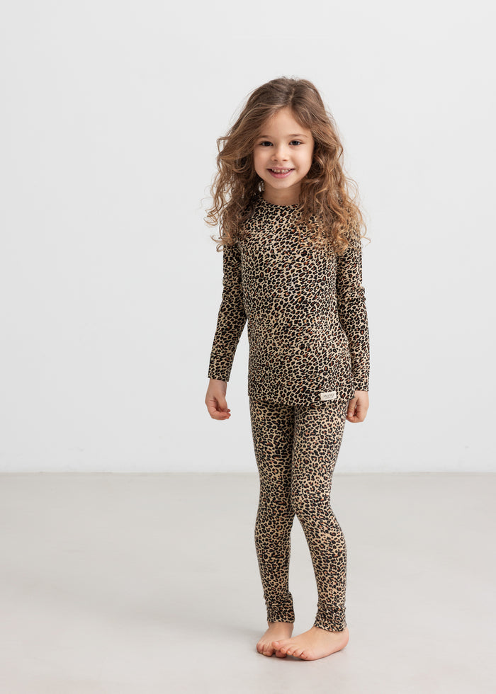Girl in leopard leggings and blouse