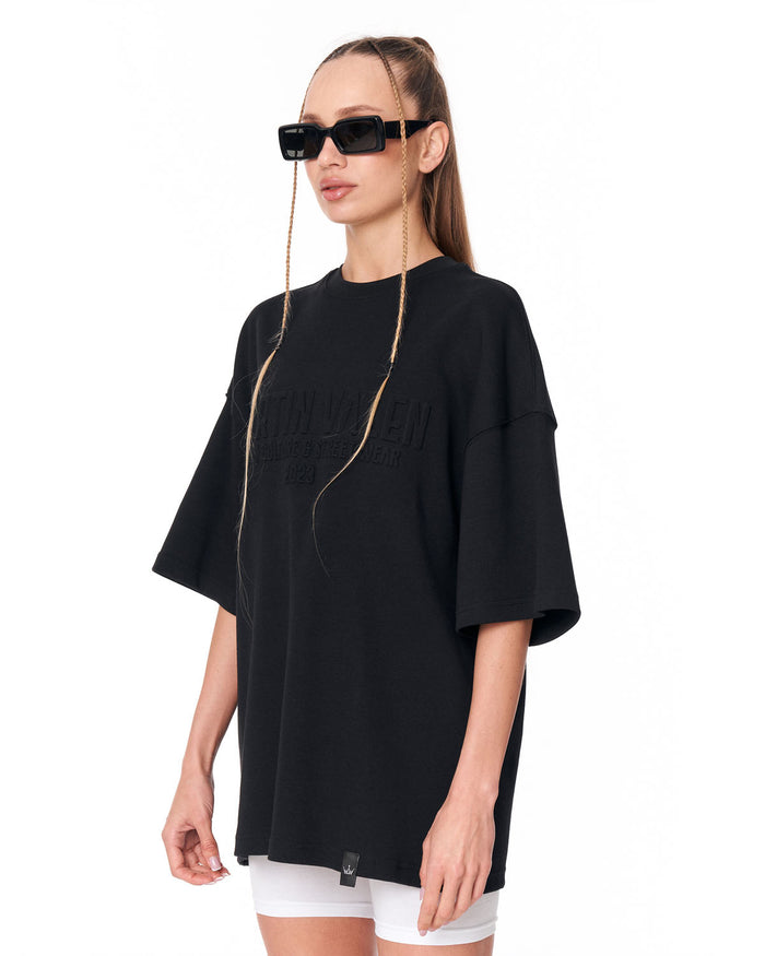 Martin Valen Oversized Embossed Basic Black T-shirt styled with white biker shorts