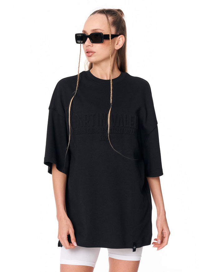 Martin Valen Oversized Embossed Basic Black T-shirt paired with black sunglasses