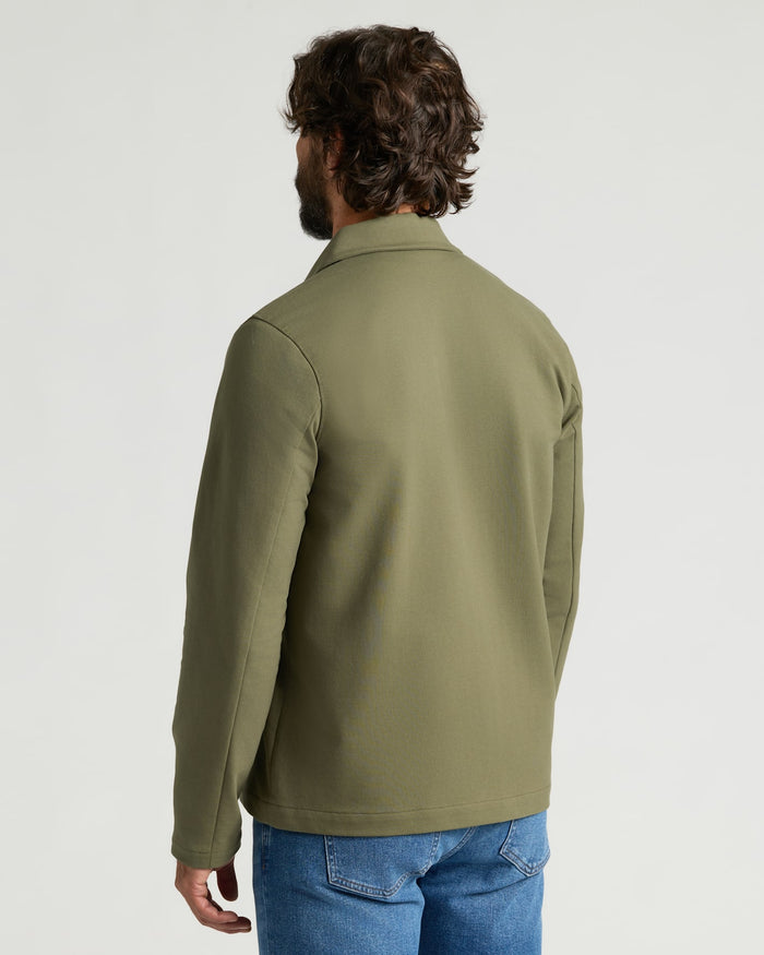 Man wearing Military Green Casual Jacket, showcasing its fit and structure.