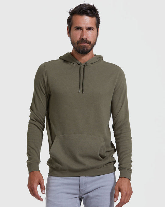 Man wearing Black & Military Green Waffle Hoodie 2-Pack, showcasing casual style.