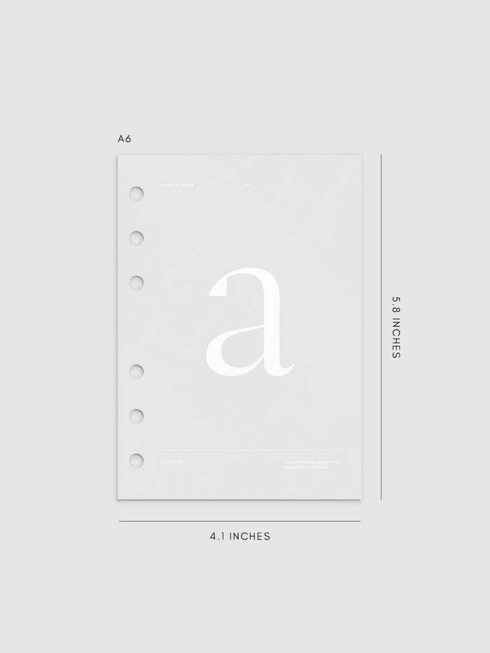 Monogram Vellum Planner Dashboard A in A6 displayed on a neutral background.