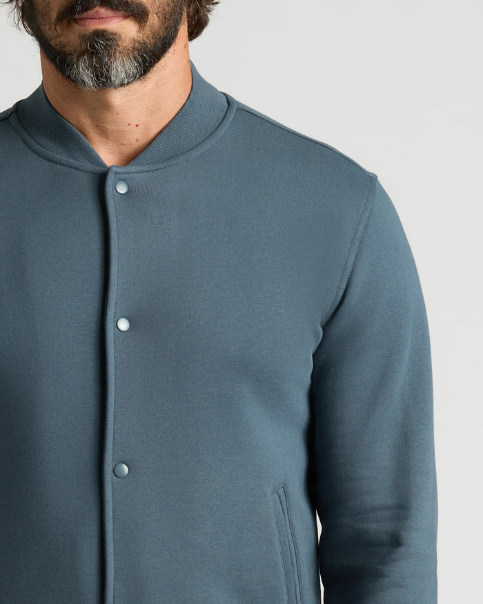 Neptune Fleece Bomber Jacket with snap-buttons and side seam pocket.