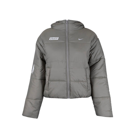 A hooded Nike Therma-FIT jacket in beige, designed for cold-weather conditions with synthetic insulation and water-repellent finish.