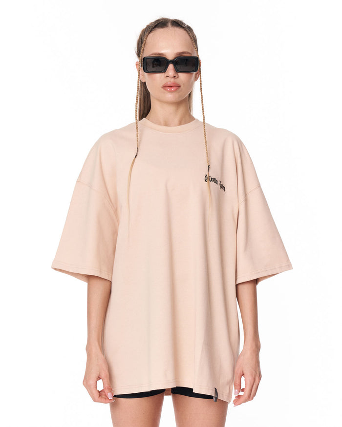 Oversized Chest 3D Printed Back Transfer Printed Beige T-shirt styled with black biker shorts