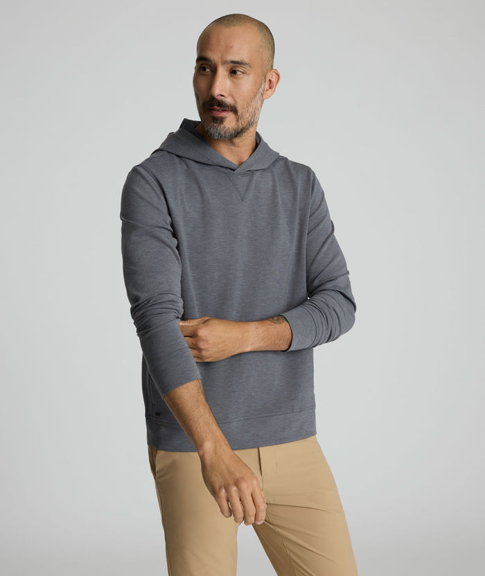 Model is wearing UNTUCKit weatherby performance hoodie.